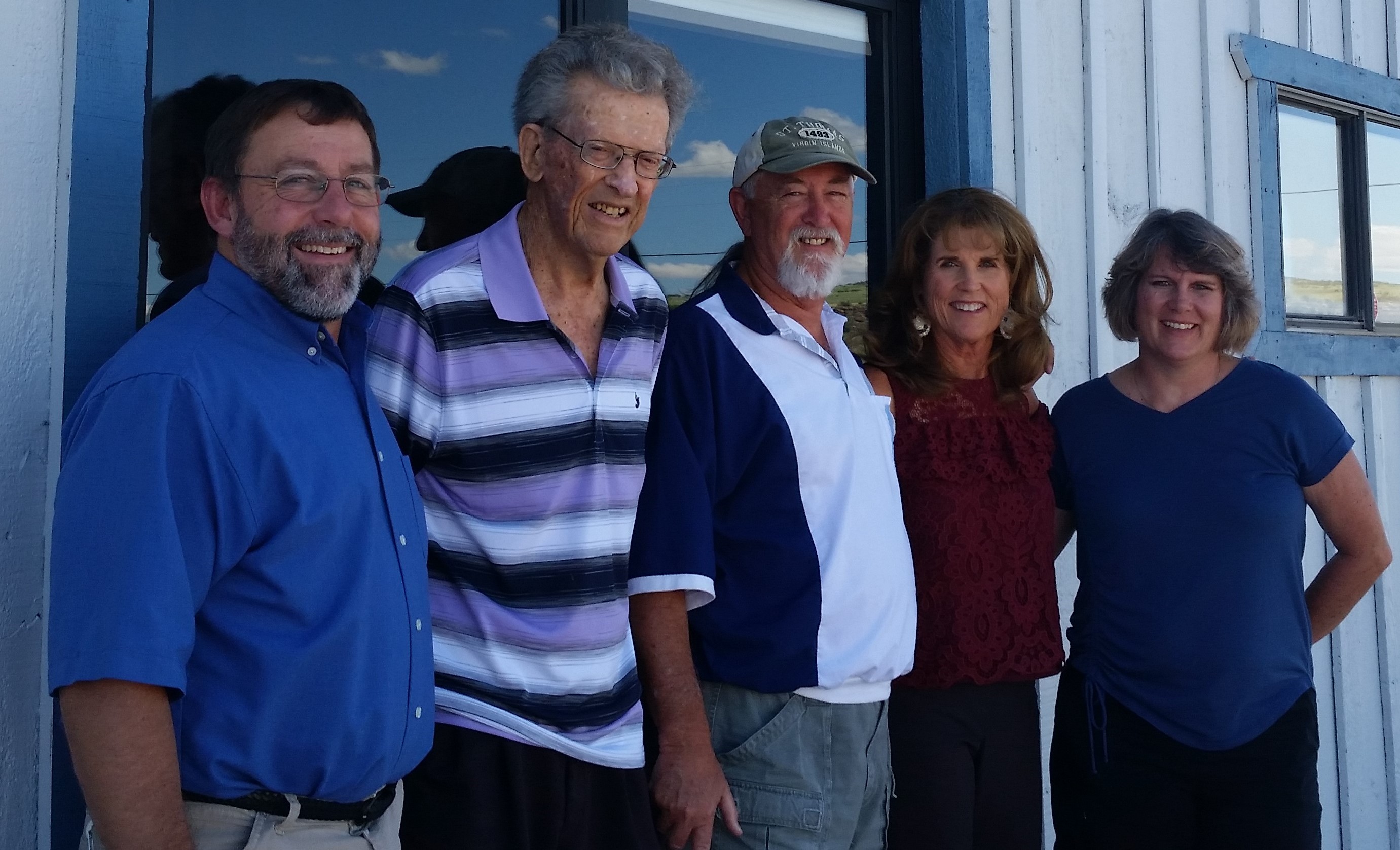 Pastor Kenny and Laurie of Calvary Chapel Round Valley welcome Dennis, Lucy, and "Dad" to their new church building.